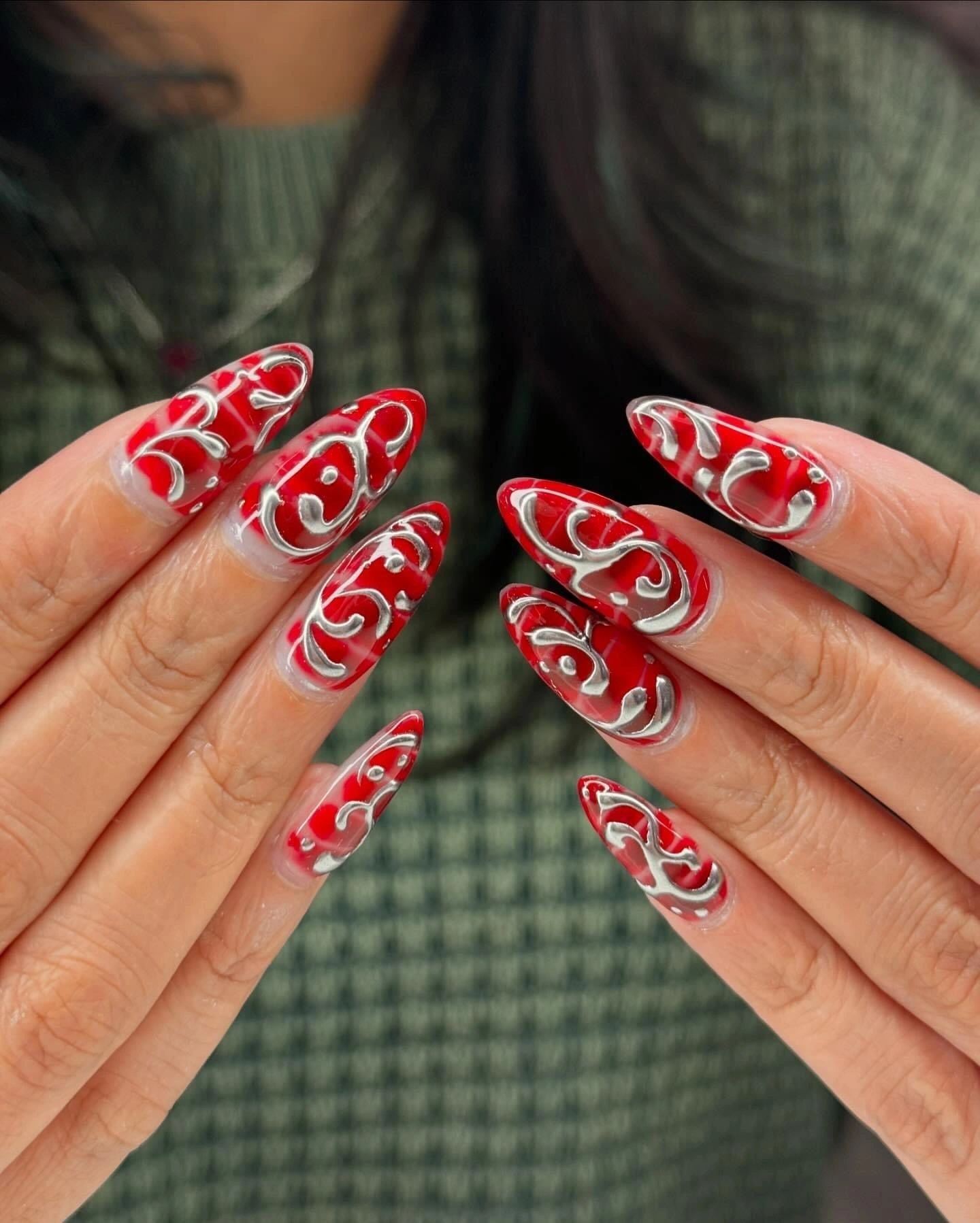 Red silver swirl nails